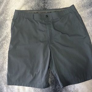 Grey stripped golf shorts.